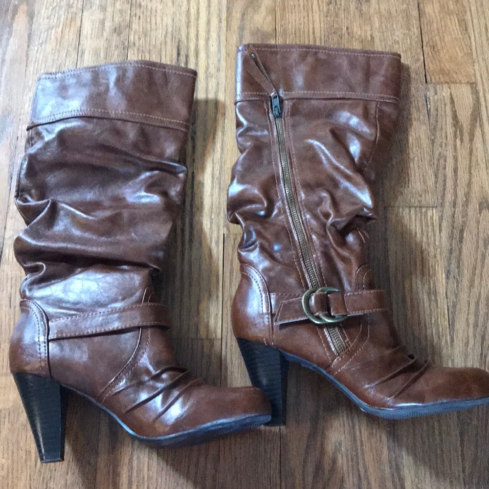 Brown boots by Guess